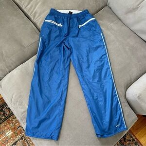 Nike Retro Track Pants women Sz L Blue Embroidered Swoosh Lined High Rise Wide